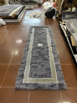 Tapis de luxe en peau de mouton naturelle - un élégant tapis fait main de style VERSACE