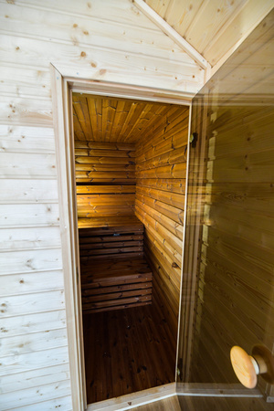 Prémium szaunaház 450×240 cm - Finn kerti szauna előszobával, ThermoWood, szigetelés 50/100 mm / fa vagy elektromos kályha WIFI-vel