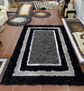 Tapis de luxe en peau de mouton naturelle - grand tapis fait main à poils longs, blanc naturel et noir VERSACE STYLE RIVER