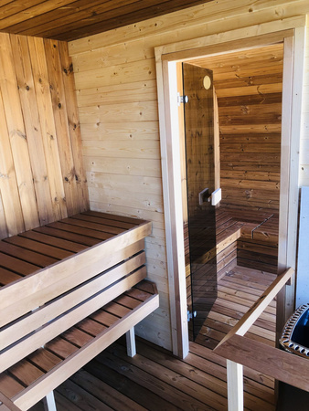 Outdoor sauna KLAAR for 4-6 people with Harvia Vega stove + cosmetics & accessories